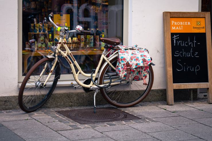 bike against store front wall in Linz